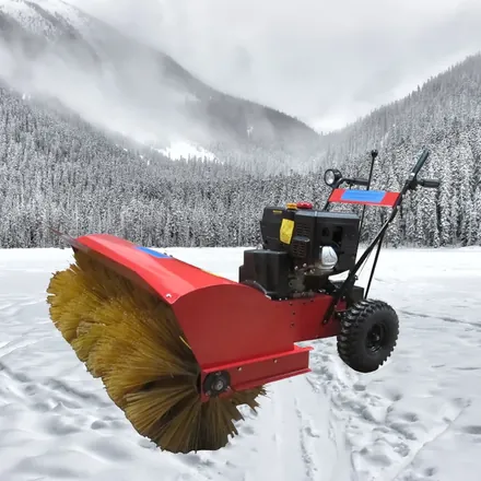 15HP hydrostatic snow sweeper showing brush head and controls