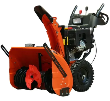 Snow blower spare parts laid out for service