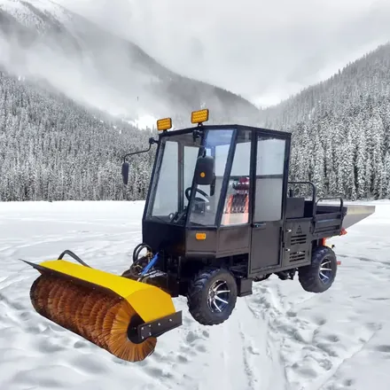 Multi function snow plough shown from the side with working head lowered