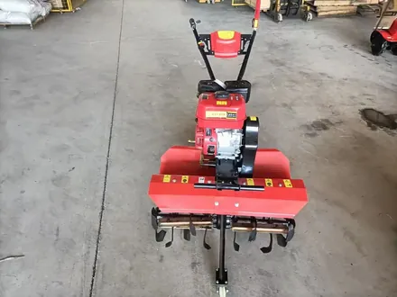 Rotary tiller rotor and blade assembly in detail