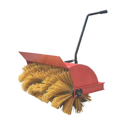 Snow sweeper head shown from the side with brush roller