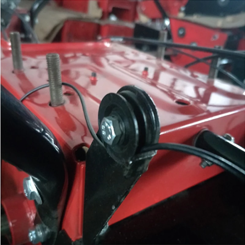 Snow blower cable pulley on white background