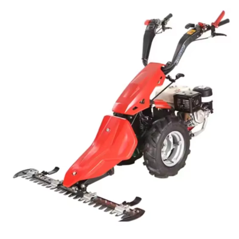 Two wheel tractor fitted with a heavy duty sickle bar mower attachment