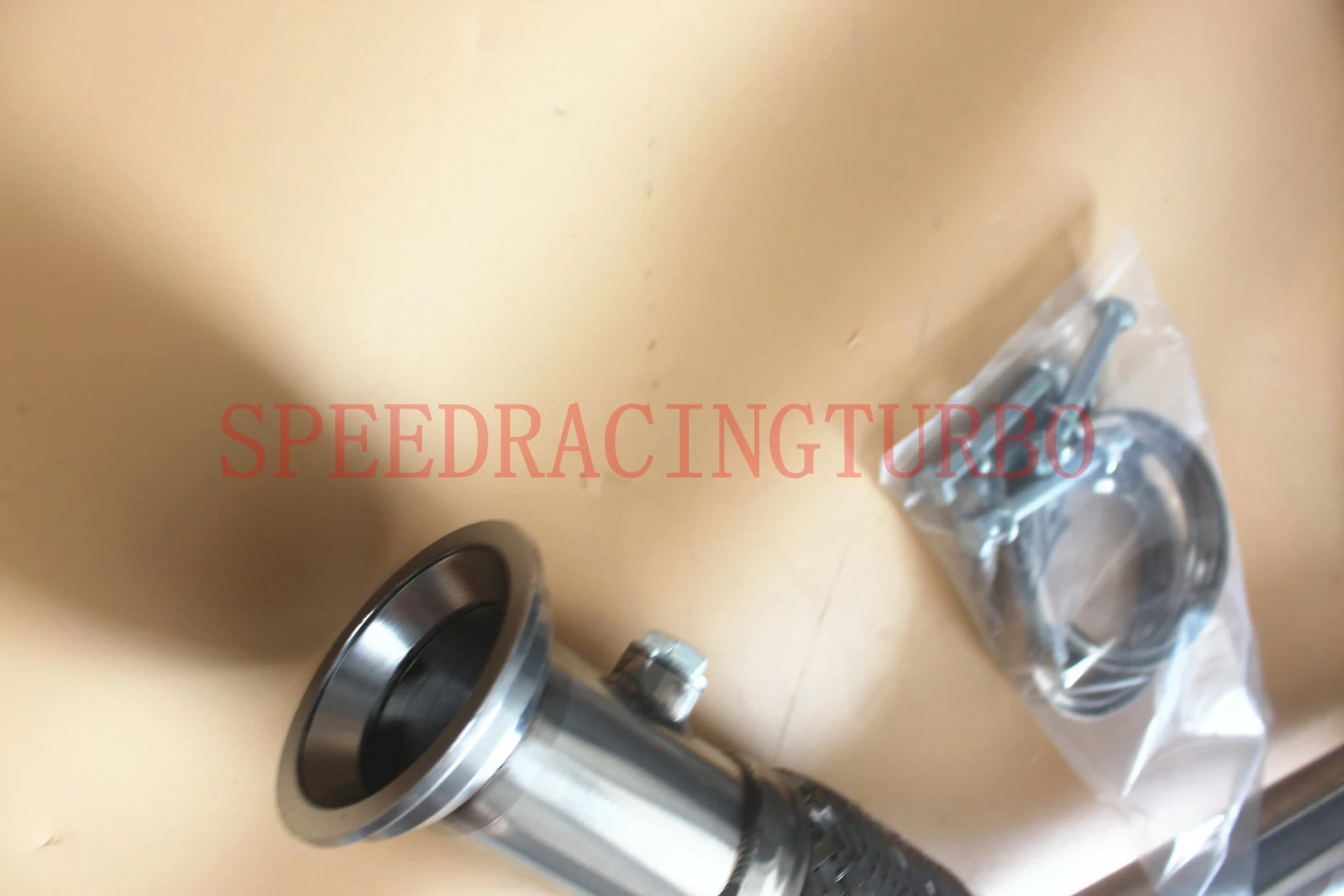 Socket outlet flange with gasket and bolt set on the exhaust x-pipe