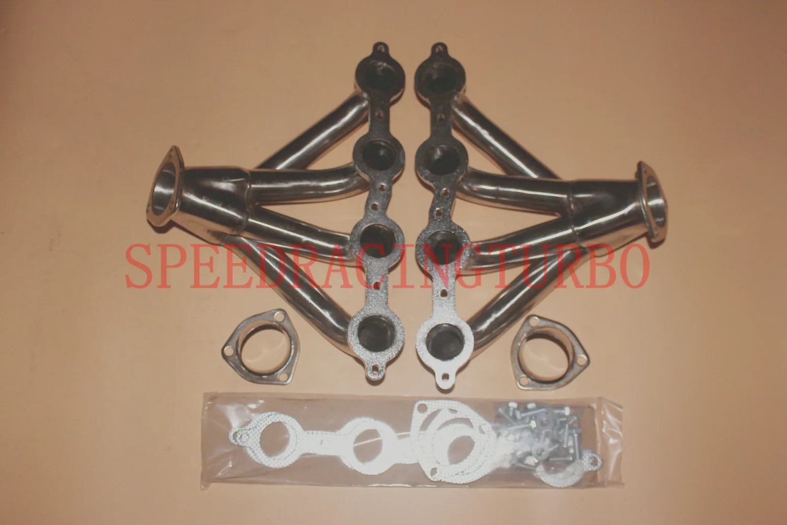 Pair of mandrel-bent exhaust headers installed on a 1997 Chevrolet small block engine