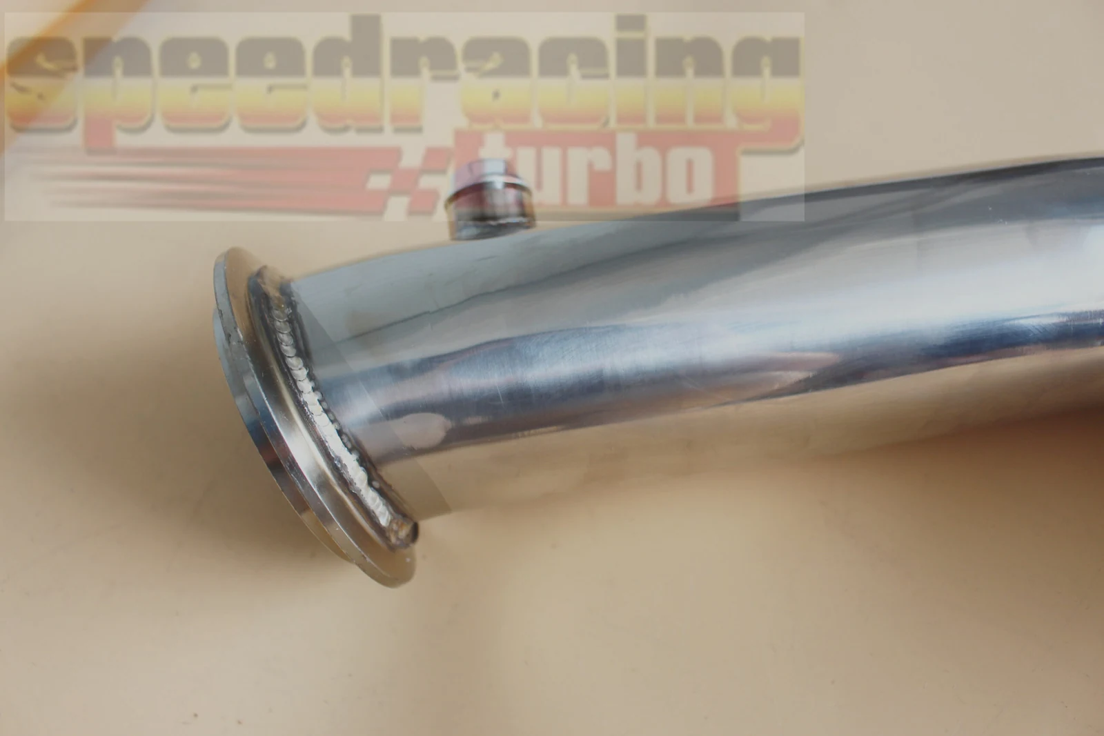 End-on view of 3 inch outlet on BMW turbo downpipe with black coated flange
