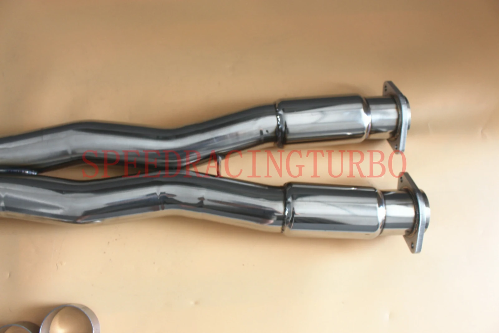 Close-up of the mirror polished 3 inch downpipe with adapter flange for Corvette C7