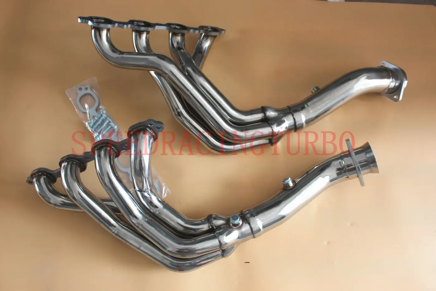 Side view of the 3 piece exhaust kit showing header, flange, and downpipe for Corvette C7