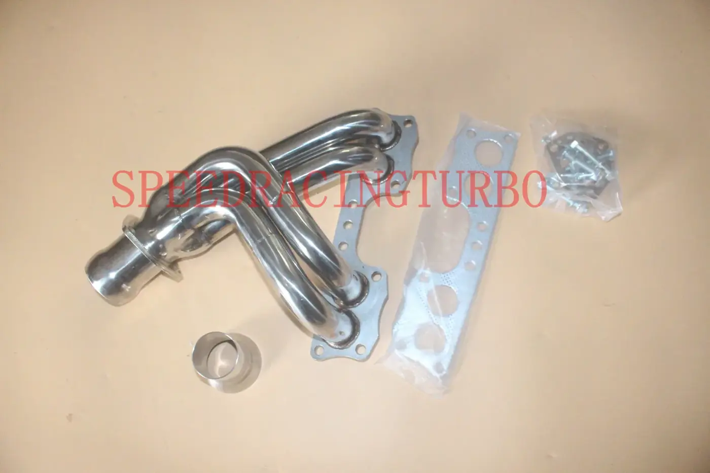 Close-up of polished 1-3/4 inch primary tubes and flange on the exhaust header