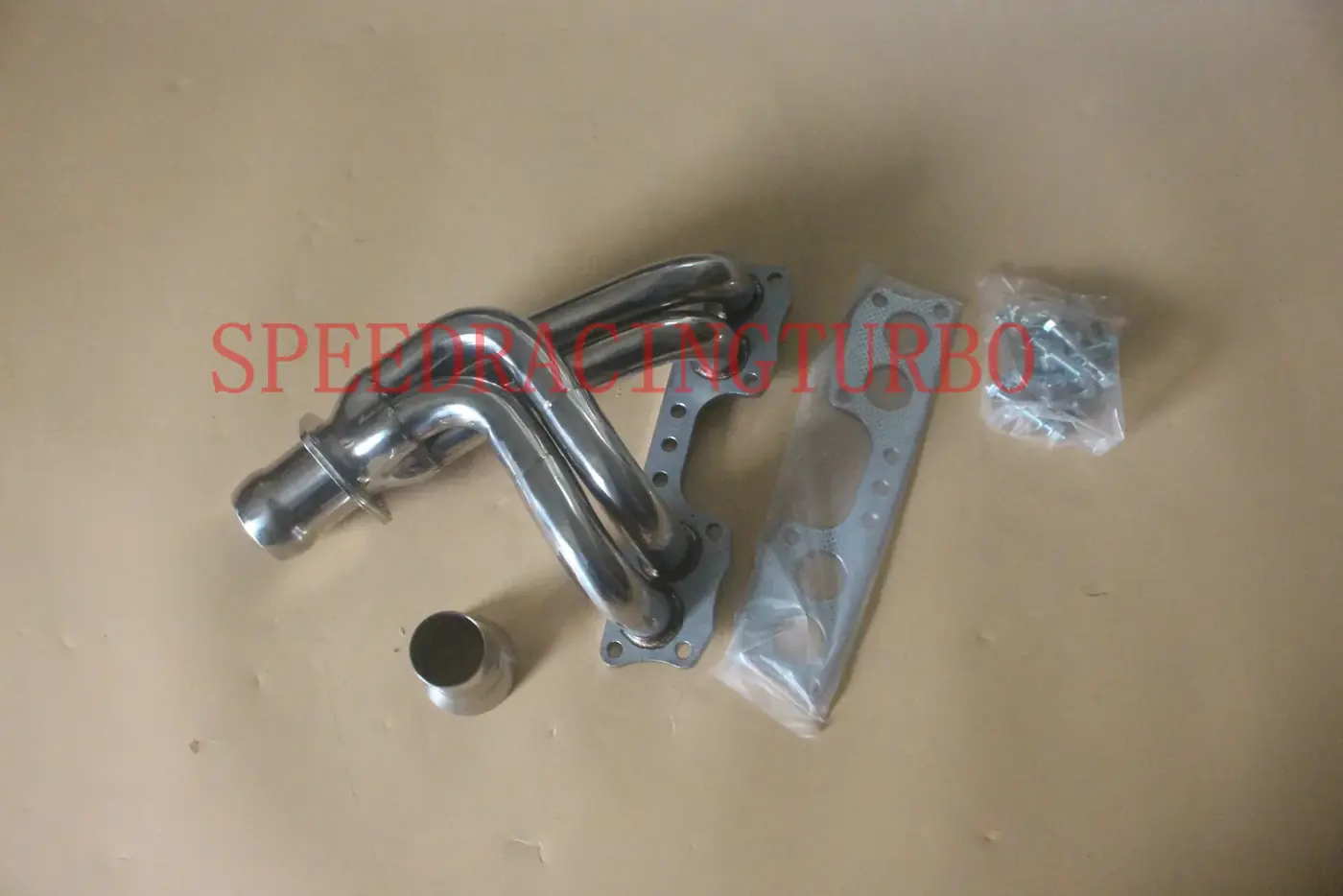 Polished stainless steel exhaust header for 1981 Toyota Celica and 1975-1988 Toyota Pickup 2.4L engine