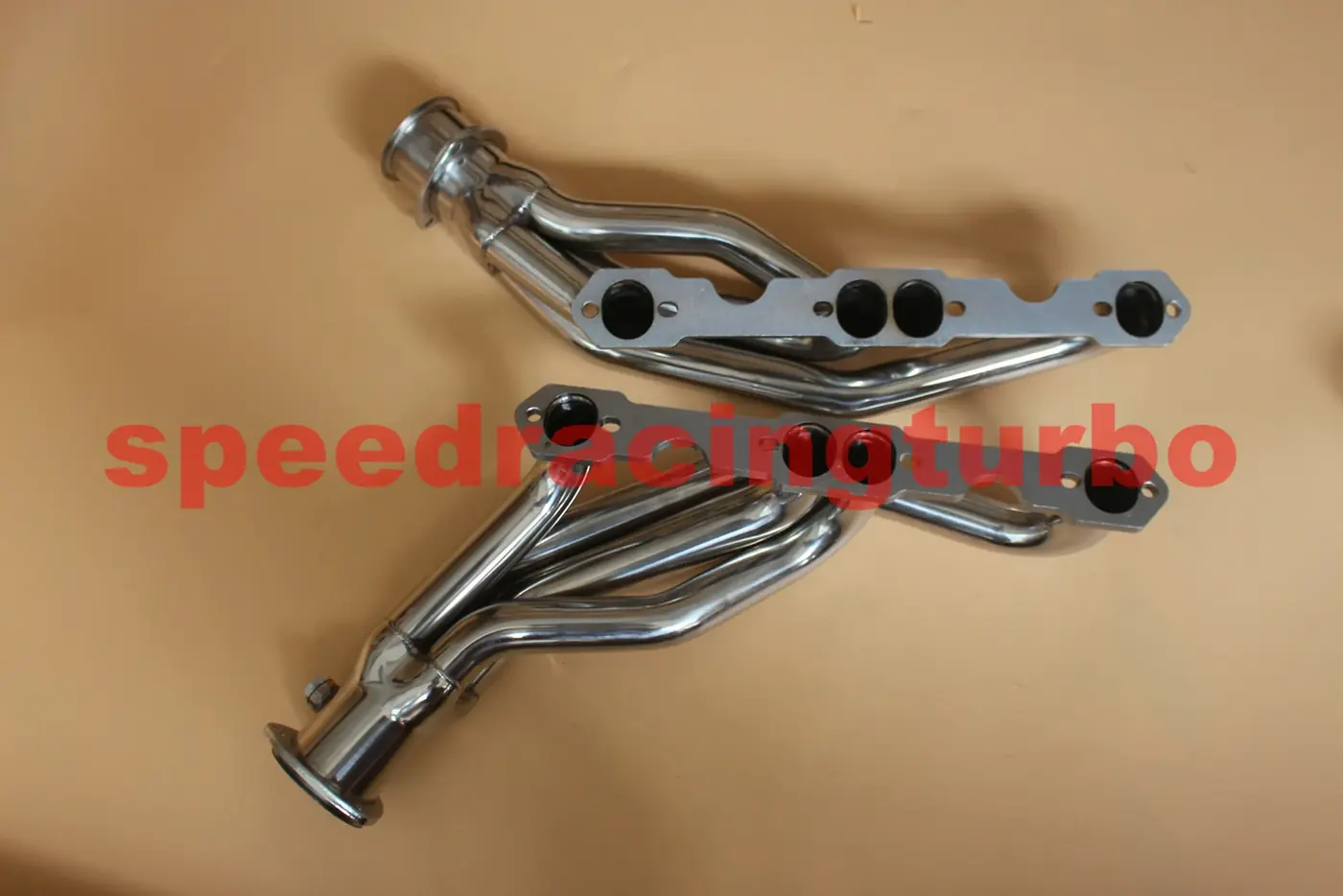 Close-up of CNC machined flange and mirror polished tube on the exhaust header