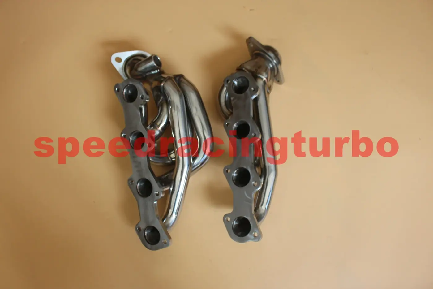 Side view of shorty header pair showing primary tube length and flange alignment