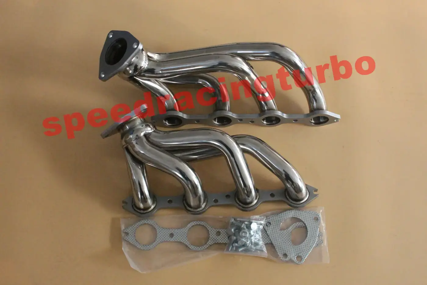 Close-up of CNC machined flange and 1-3/4 inch primary tube on the exhaust header
