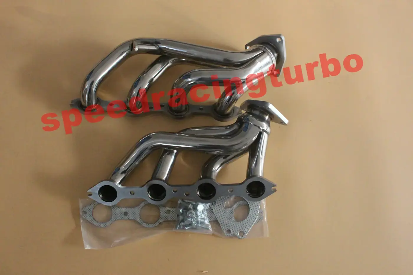 Mirror polished 1-3/4 inch shorty exhaust header for 1999-2005 Yukon XL, Sierra, and Chevy Suburban with CNC machined flanges