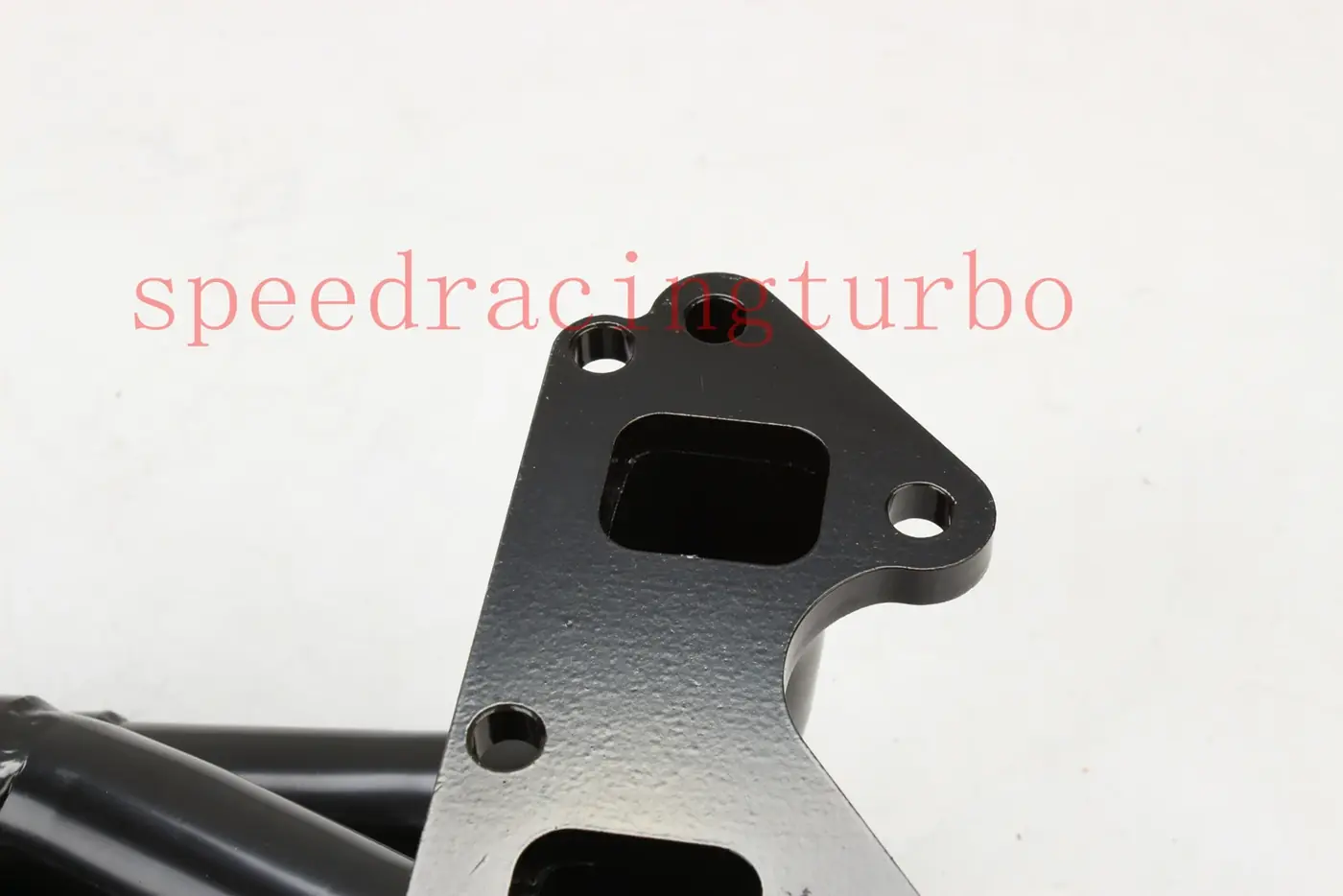 Top view of exhaust header showing primary tube layout and flange alignment