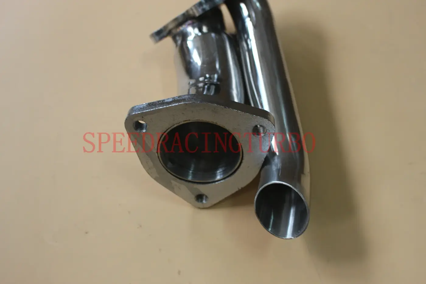 Side view of shorty header with mirror finish and included gasket