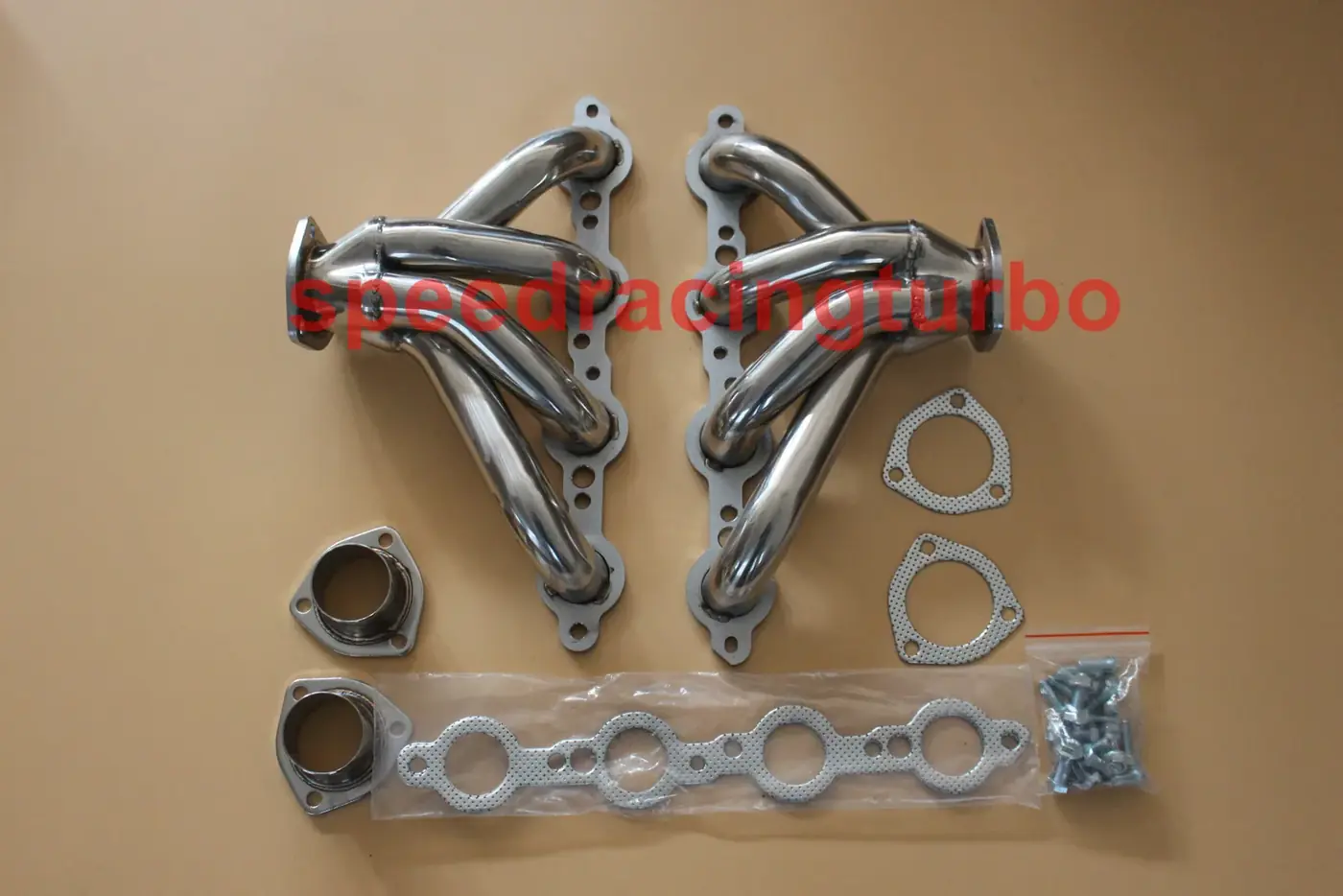 Polished 304 stainless steel exhaust header with 1-5/8 inch primaries and CNC machined flanges