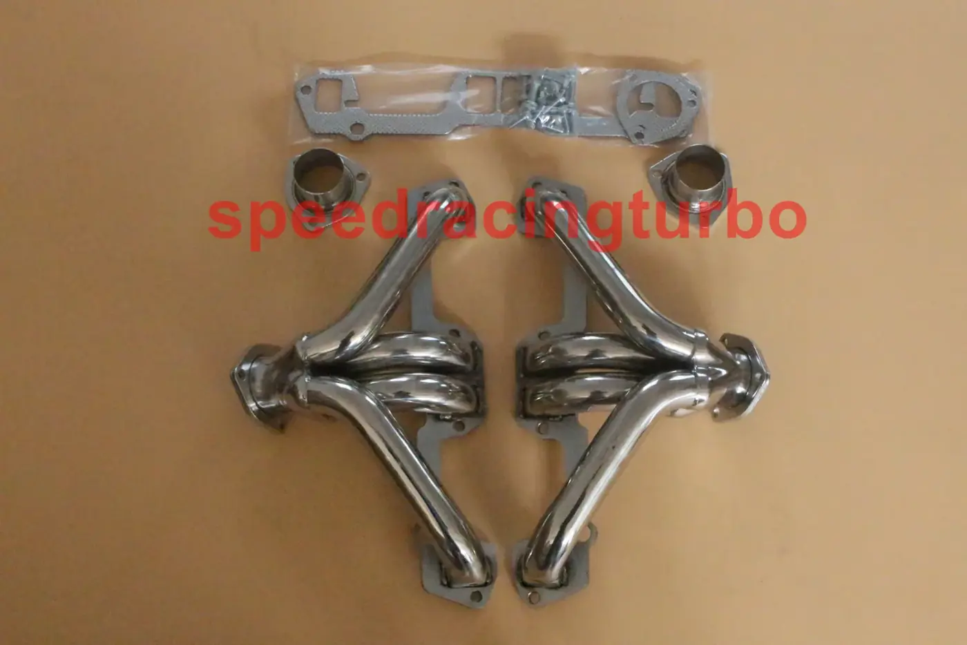 Close-up of CNC machined flange and TIG welded joint on a shorty exhaust header