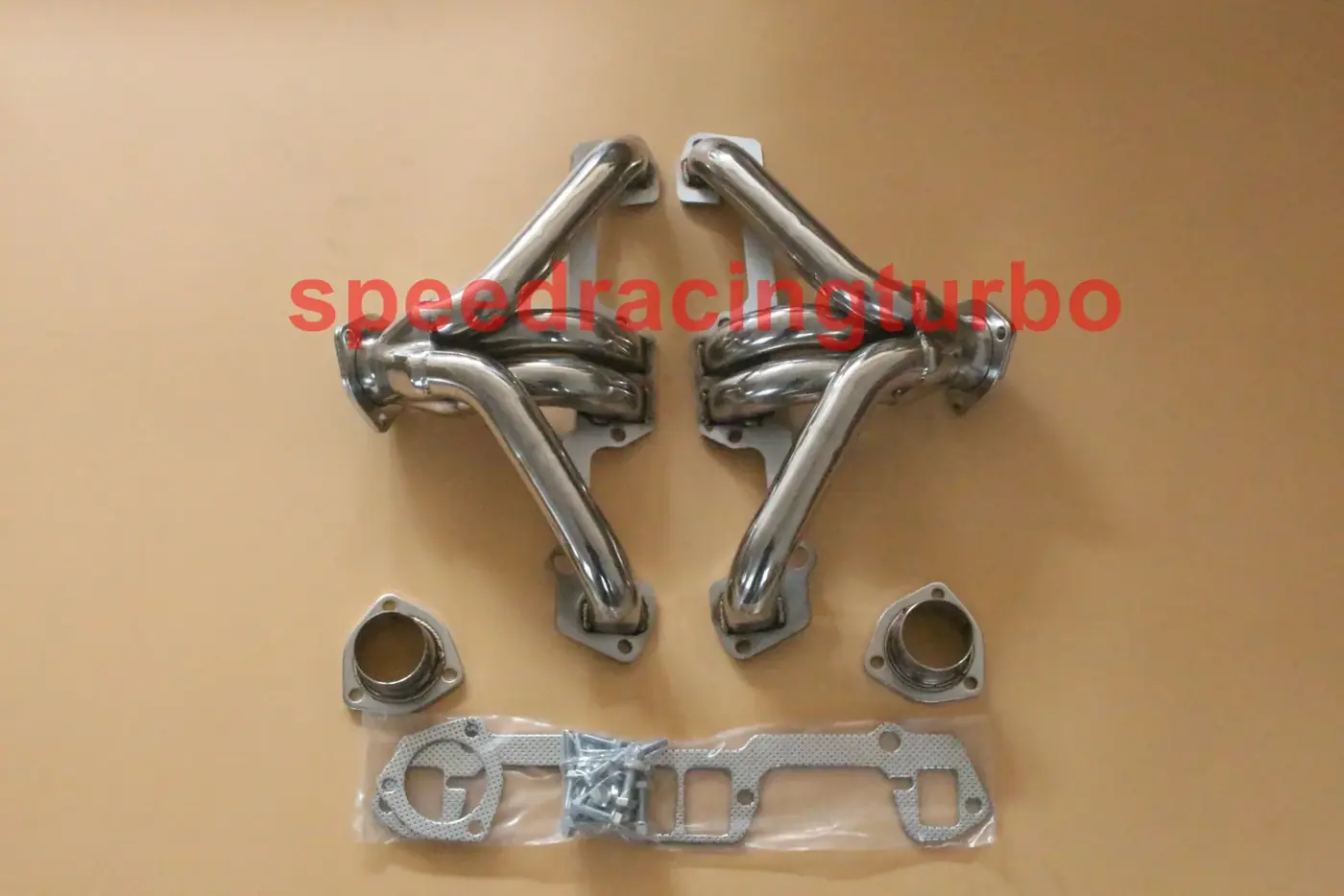 Pair of stainless steel shorty exhaust headers with CNC machined flanges and mandrel bent tubing