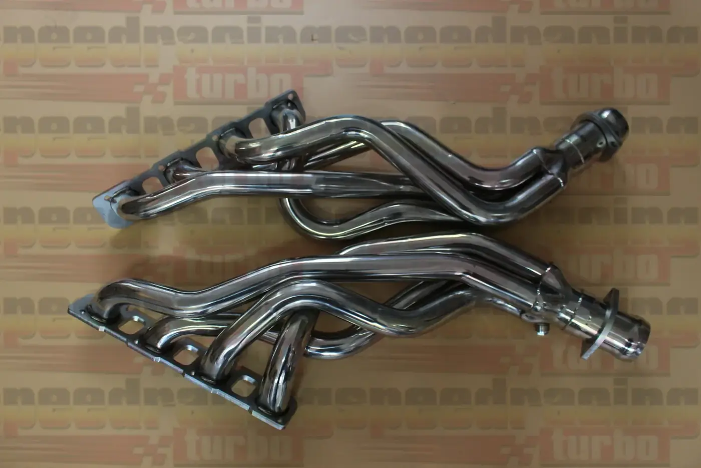 Header flange and mounting bracket detail with CNC machined bolt holes