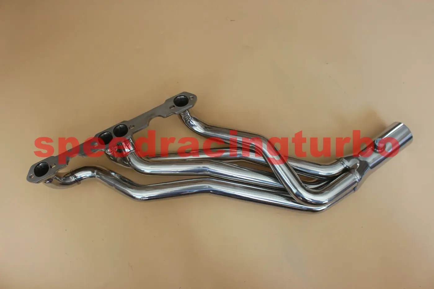 Header kit installed on a 1995 Camaro with factory exhaust routing