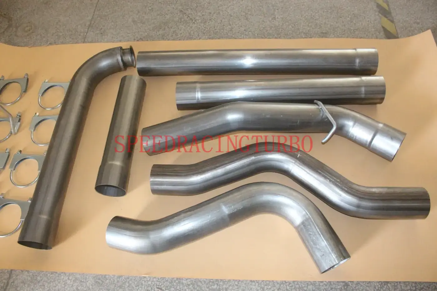 Side view of the 4 inch downpipe with O2 sensor bungs and included hardware