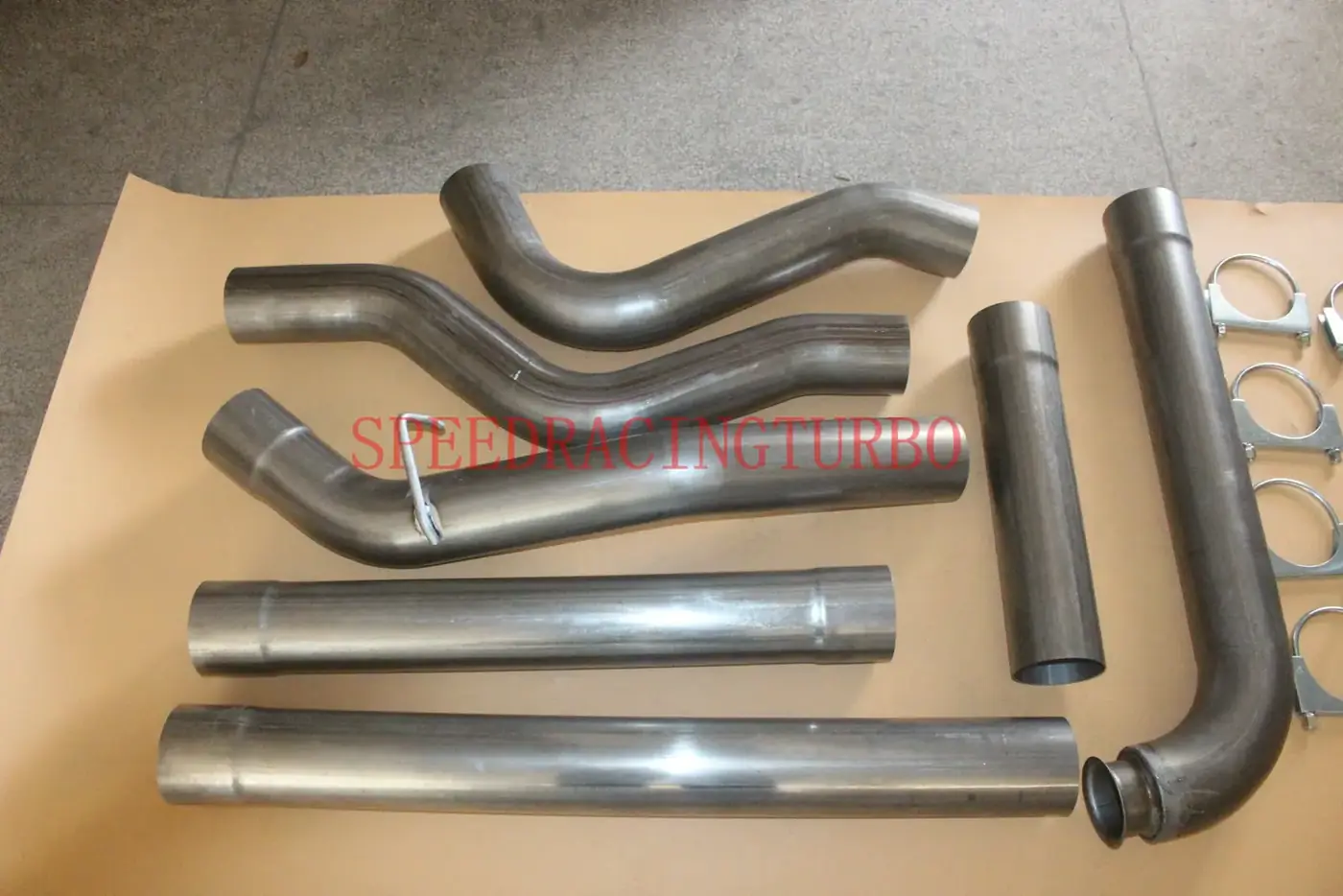 Top view of the downpipe showing the 4 inch bore and polished finish