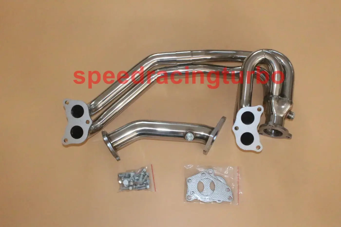 Close-up of CNC machined flange and TIG welded joint on a 1-7/8 inch header for Subaru EJ20 EJ25
