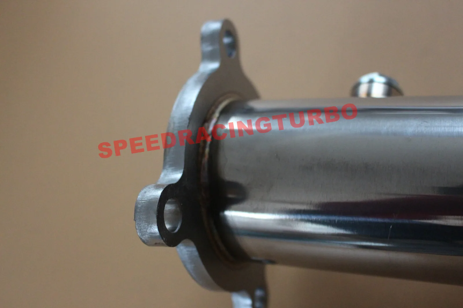 End-on view of 3 inch outlet with O2 sensor bung and flange on Audi performance downpipe