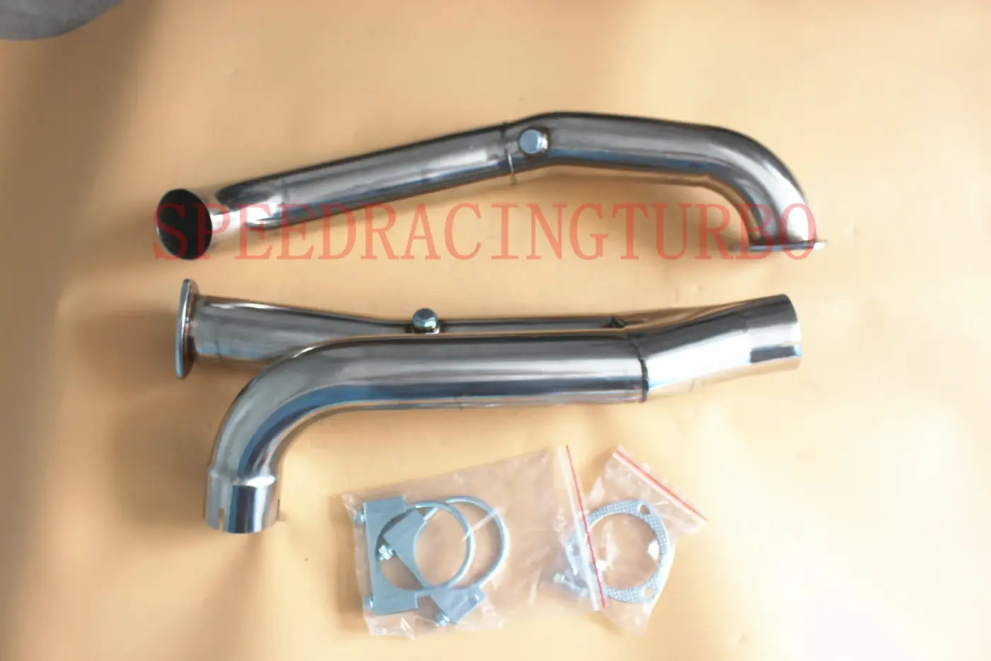 Close-up of the pre-fitted flanges and included hardware on the Y-pipe downpipe