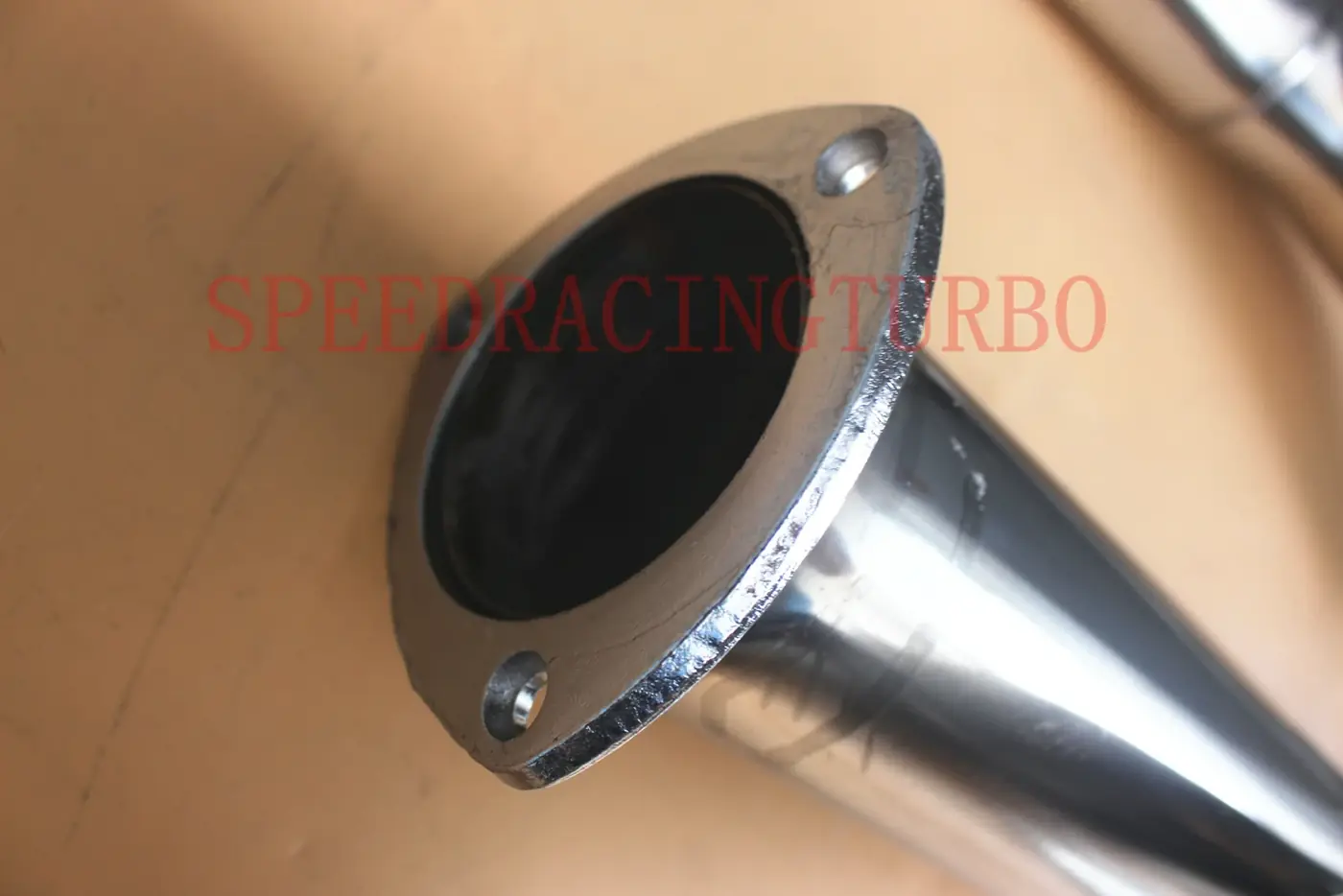 Detail of the welded joint between the Y-pipe and flanges with no visible defects