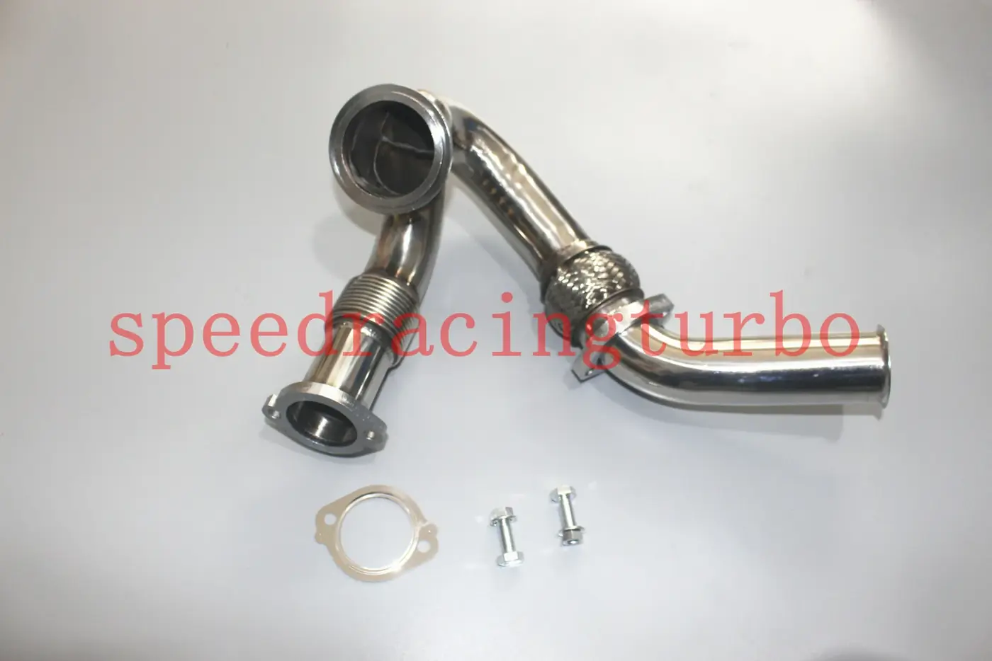 Close-up of stainless steel X-pipe flange with factory bolt pattern