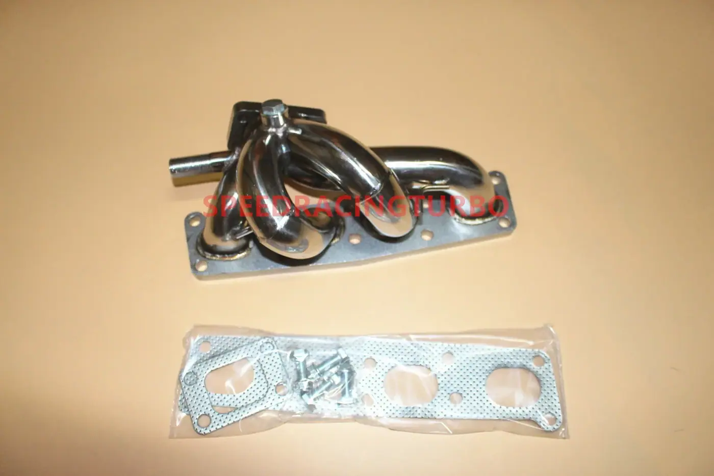 CNC machined flange on stainless steel turbo manifold with T25 and T2 configuration