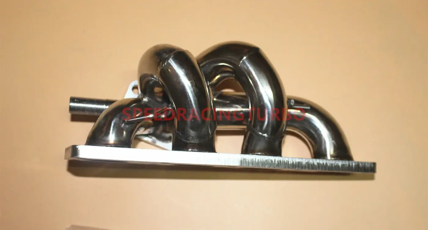 Side view of stainless steel turbo exhaust manifold showing seamless TIG welds and mirror finish