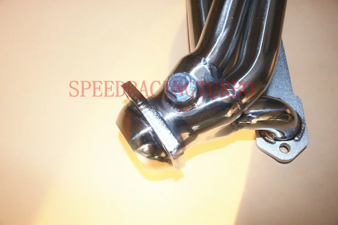Top view of a 1-3/4 inch header with mirror polish finish and chrome plated flanges