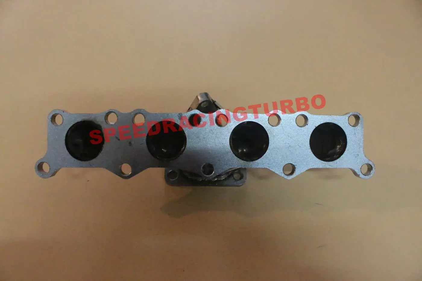Top view of manifold showing factory mounting points and flange alignment