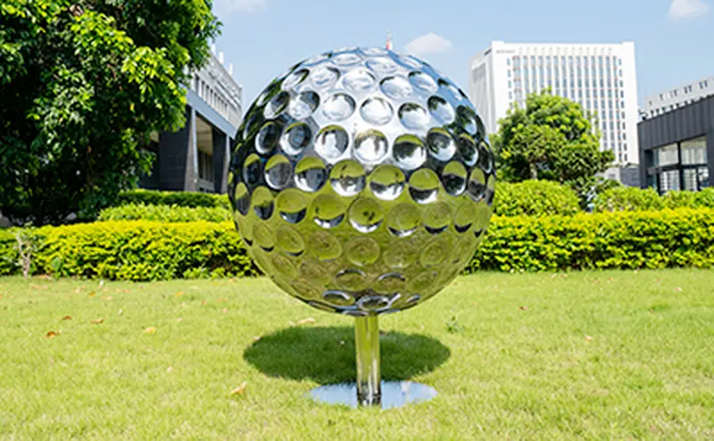 Mirror polished stainless steel sculpture in the workshop