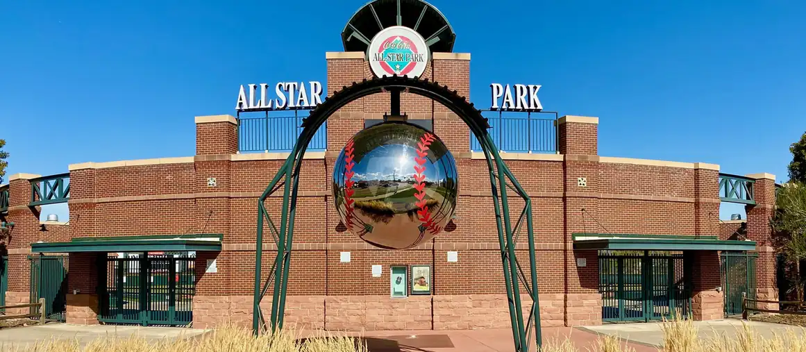 Stainless steel baseball sculpture at Coca-Cola All-Star Park