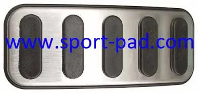 Ford Edge Sport Pad 7 — stainless face with four elongated rubber slots