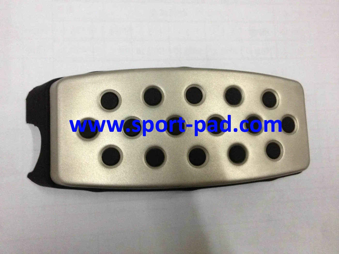 GM Sport Pads 4 — brushed stainless face with round rubber studs and a moulded black flank