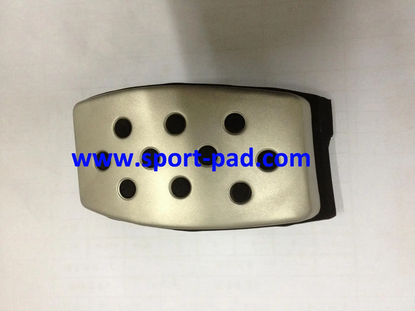 GM Sport Pads 5 — brushed stainless face with round rubber studs, wide outline
