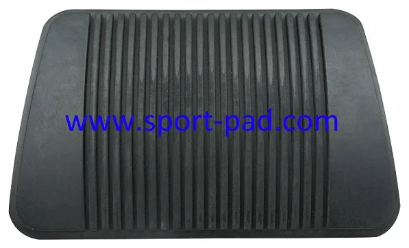 Rubber Pad 1 — rectangular pad, coarse longitudinal ribs, rounded corners