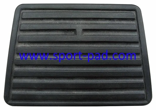 Rubber Pad 9 — rectangular pad, fine longitudinal ribs, domed profile