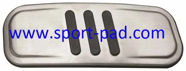 Taurus Sport Pad 9 — wide stainless face with four elongated rubber slots