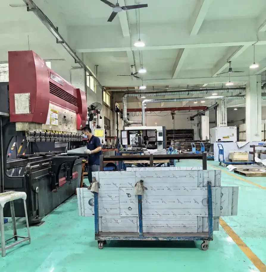 Assembly area at the SRX workshop with stainless assemblies staged on transfer trolleys