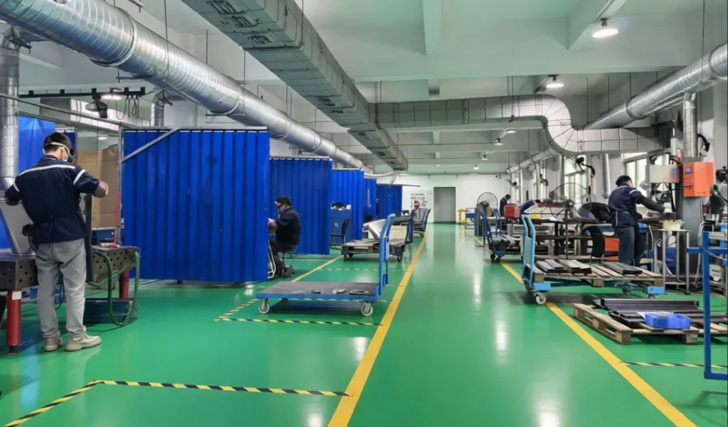SRX assembly workshop in Shenzhen with stainless steel weighing equipment under build
