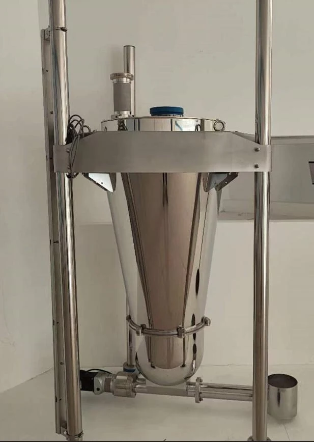 High-precision feeder installed on a stainless steel support frame