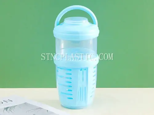 Plastic Portable Handheld 2-Layer Drainable Fruit Cup With 2 Forks NC035110 plastic houseware product photograph