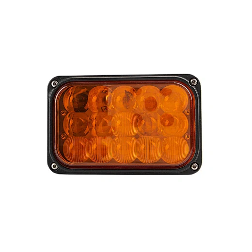 Front view of the LED headlight showing the 15 Bridgelux 3W LEDs and convex polycarbonate lens