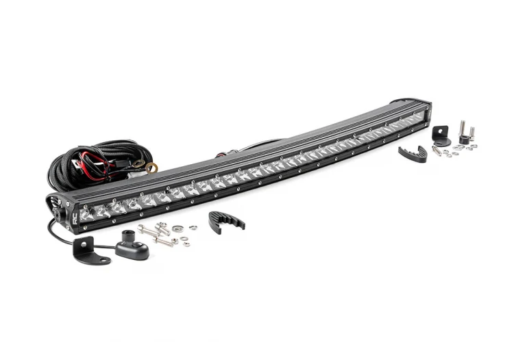 30-inch SLL-14030 LED light bar mounted on a vehicle with a curved housing and stainless bracket